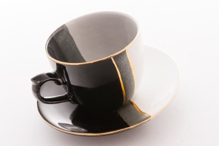 Filiżanka ze spodkiem biało czarna Trio Mieroszów