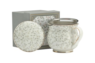 Kubek biały z motywem kwiatowym z sitkiem do parzenia herbaty i ziół