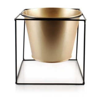 Nowoczesna złota osłonka na czarnym stelażu na doniczkę