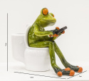 Ozdobna figurka na biurko żaba na sedesie z telefonem