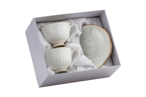 Filiżanki ze spodkiem 2 szt w pudełku białe złote porcelana