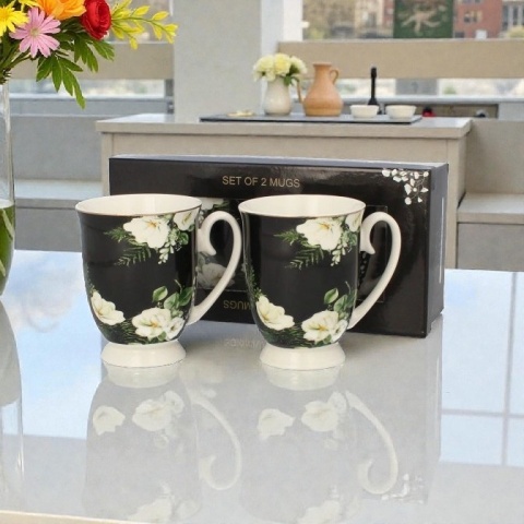 Komplet dwóch kubków na stopce Livello kwiaty białe prezent